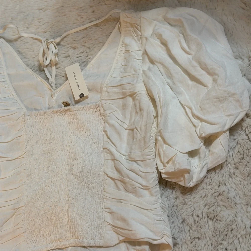 Anthropologie chic cream